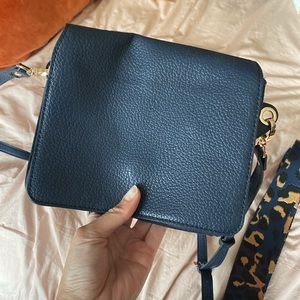 navy blue purse with extra strap